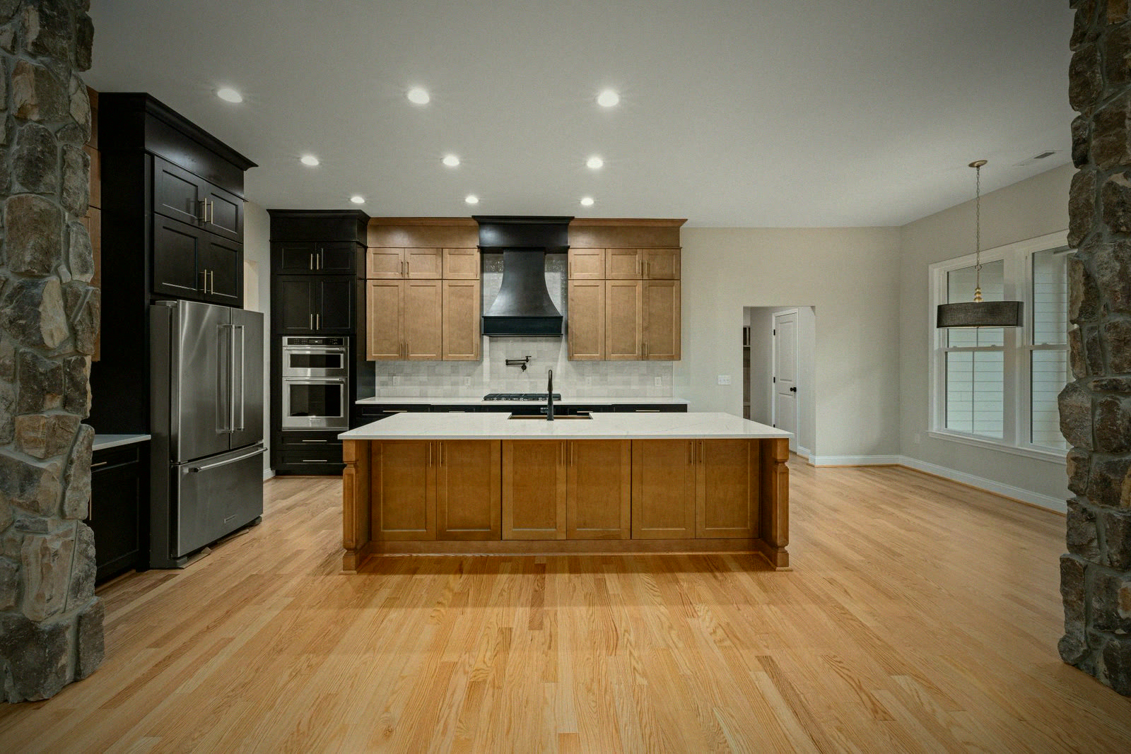 Remodeled kitchen with two-tone cabinets