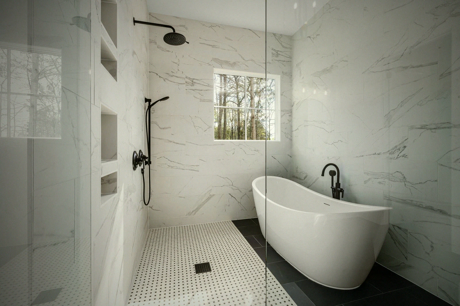 Marble bathroom with freestanding tub