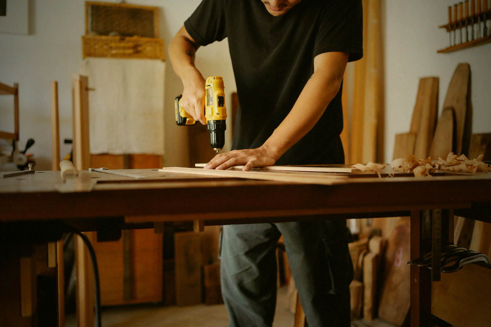 Carpenter drilling trim work