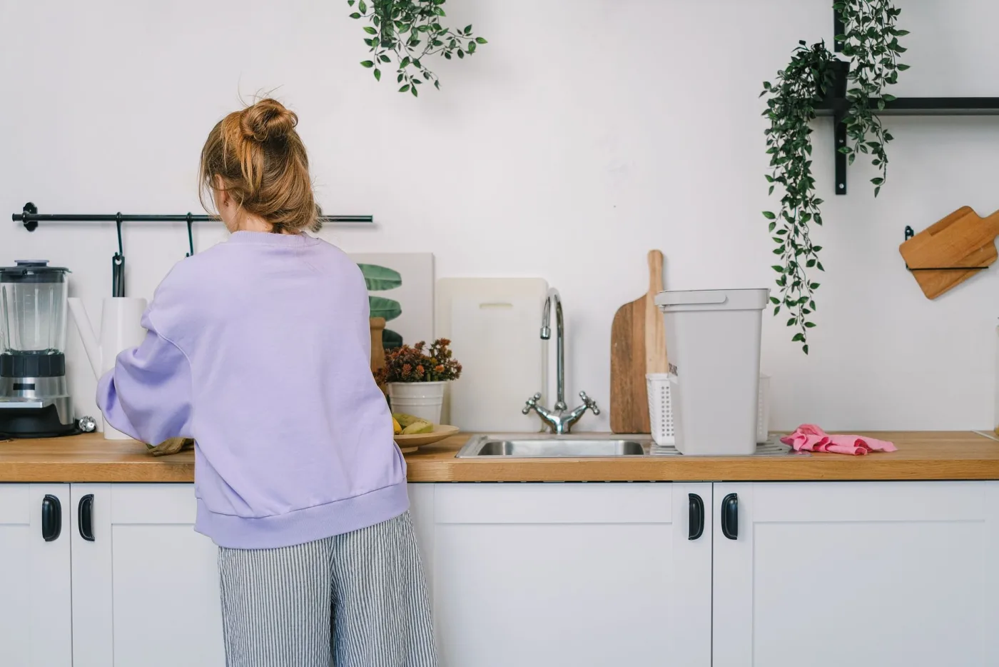 A clean, tidy kitchen sink and counter area