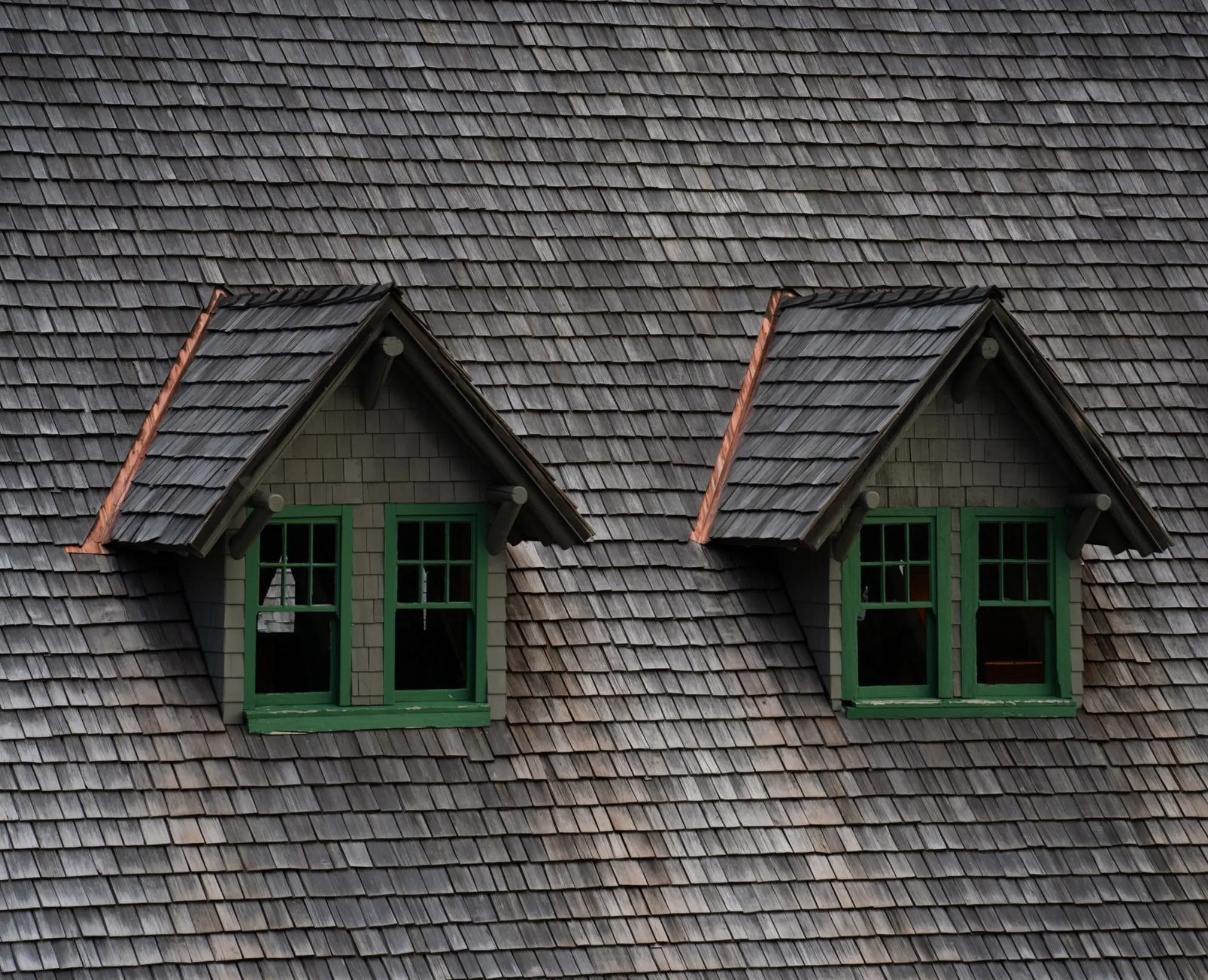 Roofing crew installing new asphalt shingles on an Atlanta home
