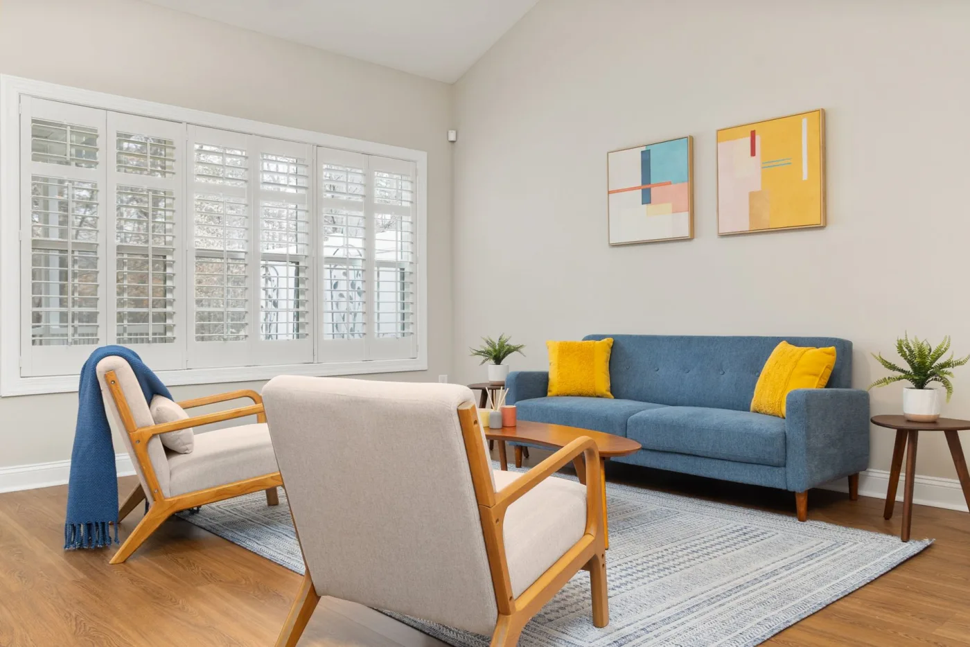 A tidy, styled living room with fresh finishes after a cleaning
