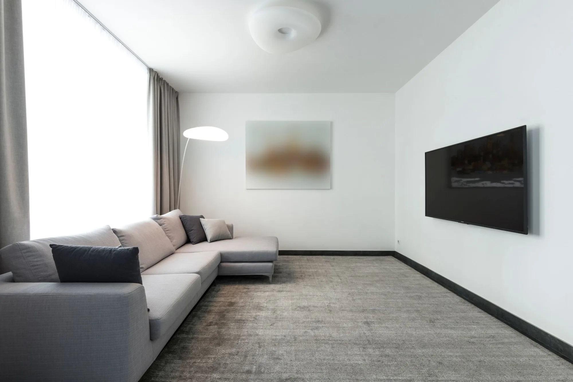 A bright, freshly cleaned modern living room in an Atlanta home