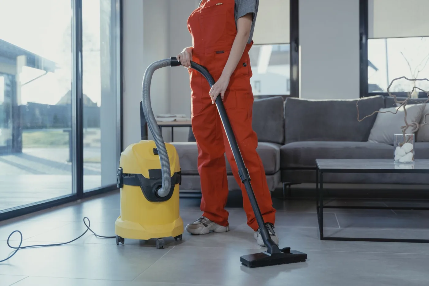 Vacuuming a living room floor until it looks fresh