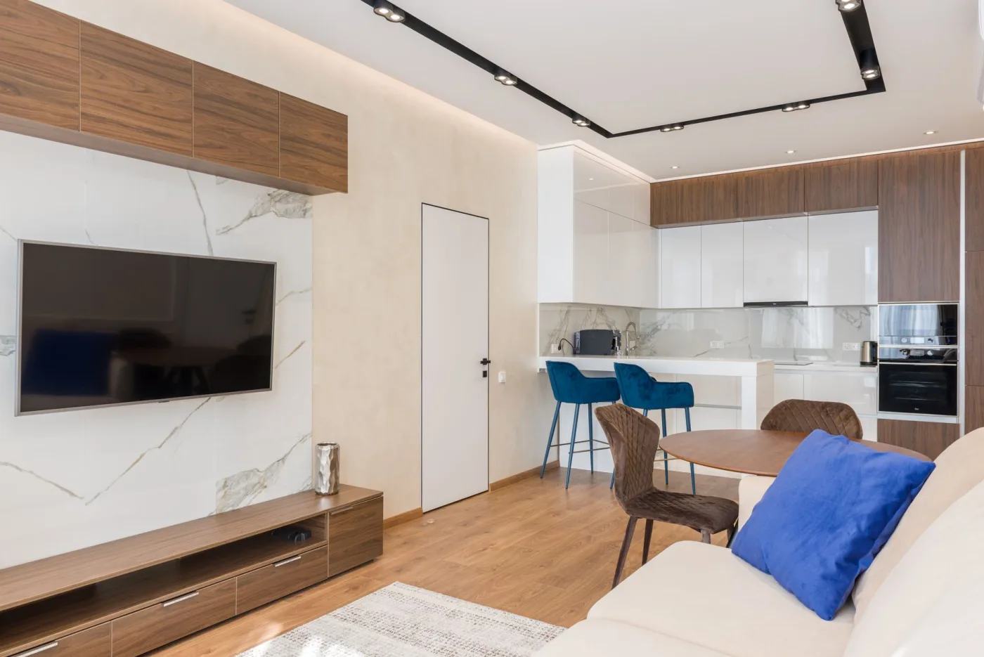 Detailed modern kitchen and living area cleaned after construction