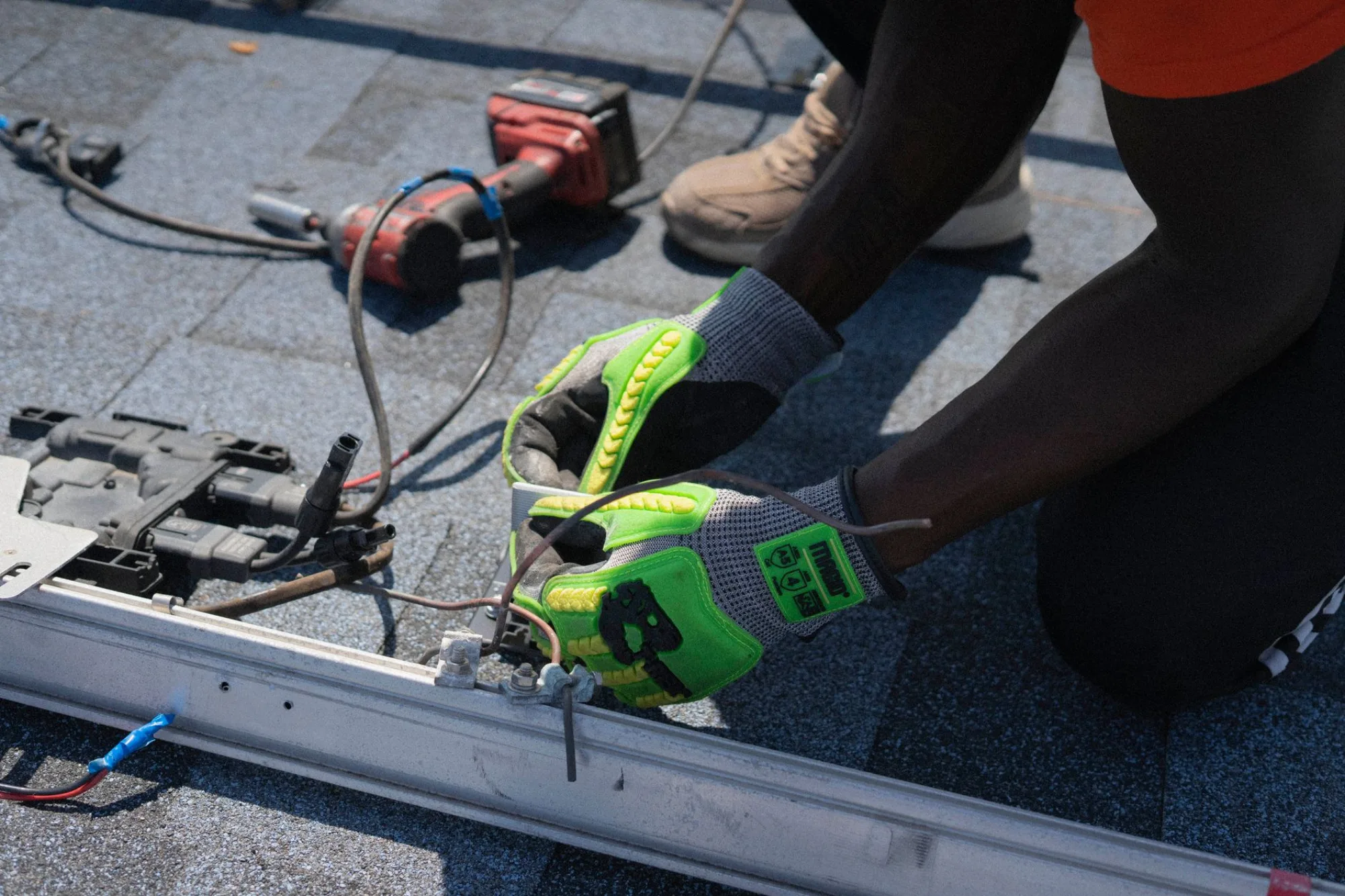 Roofing crew installing new asphalt shingles on an Atlanta home